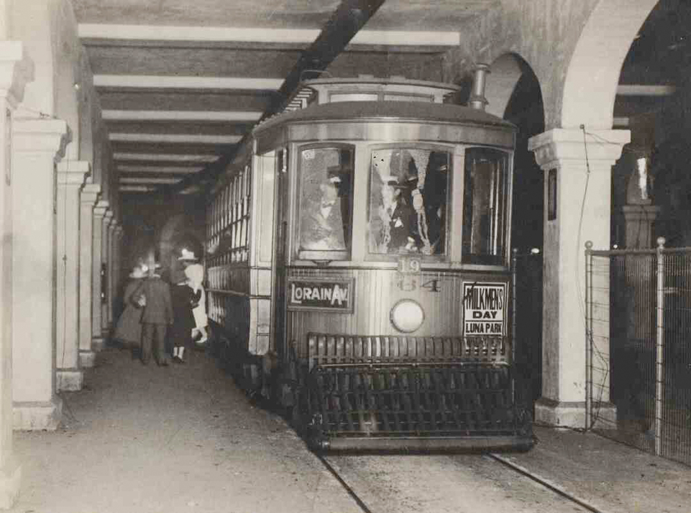 A streetcar picks up passengers at the West 25th Street subway station located underneath the Detroit-Superior Bridge in 1918